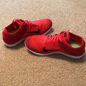 Nike Free. Size 8 men’s. Color: Orange/red.